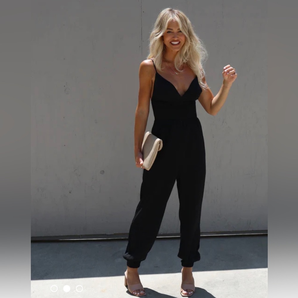 Black smocked jumpsuit - never worn!